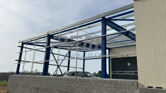 Přístavba skladovací haly pro zemědělskou techniku - Montáž opláštění